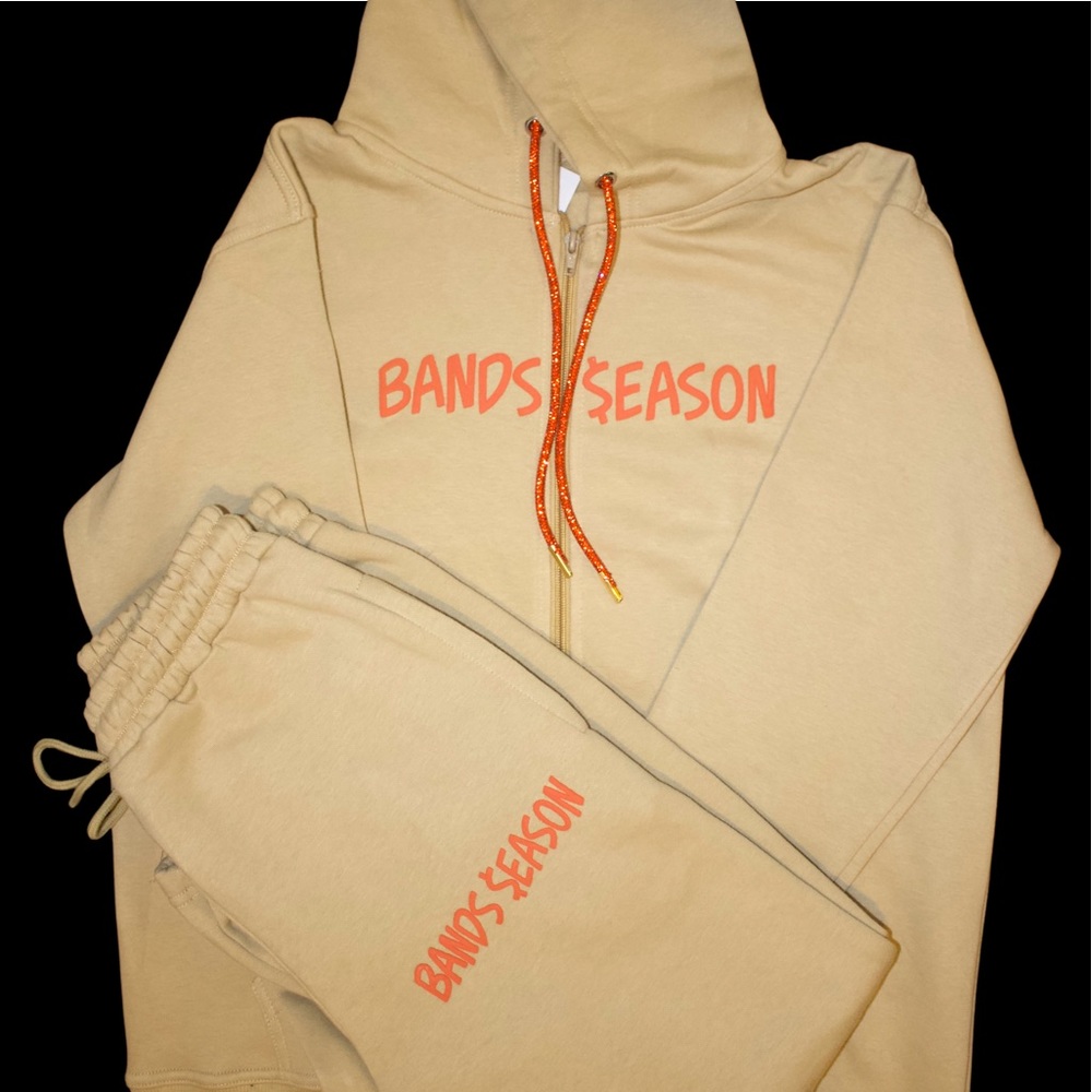 2 piece unisex sweat suit. Zip up hoodie top and drawstring sweatpants bottoms.